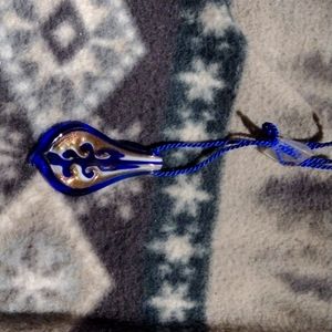 a blue white and gold necklace it's worth 2500.00 real beautiful